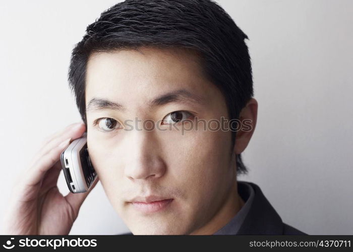 Portrait of a businessman talking on a mobile phone