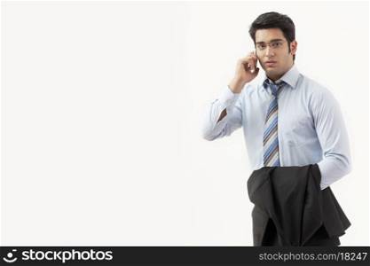Portrait of a businessman talking on mobile phone