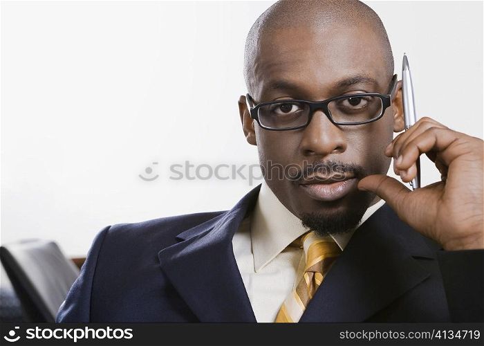 Portrait of a businessman thinking