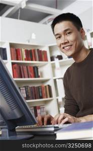 Portrait of a businessman using a computer