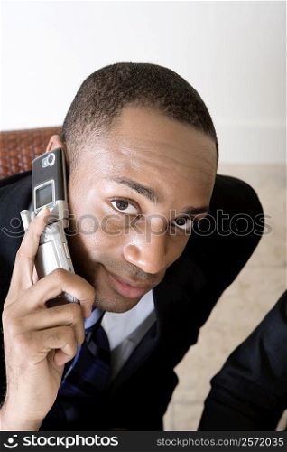 Portrait of a businessman using a mobile phone