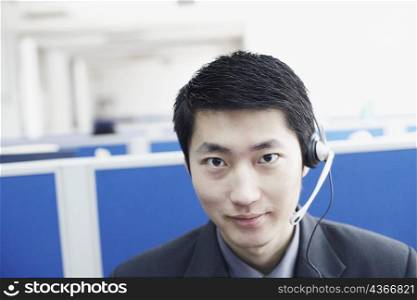 Portrait of a businessman wearing a headset