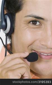 Portrait of a businessman wearing a headset and smiling