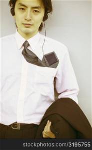Portrait of a businessman wearing headphones