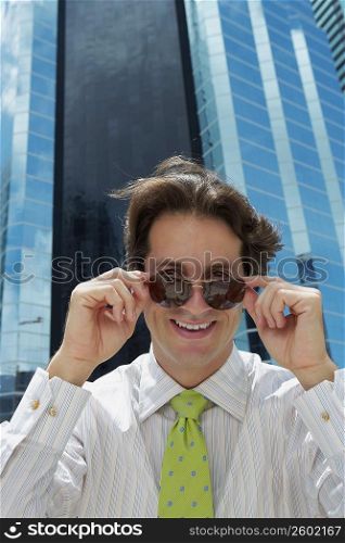 Portrait of a businessman wearing sunglasses