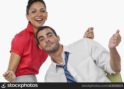 Portrait of a businesswoman and a businessman dancing together