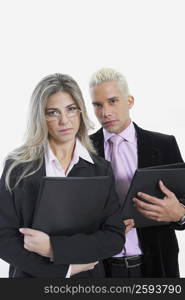 Portrait of a businesswoman and a businessman holding files