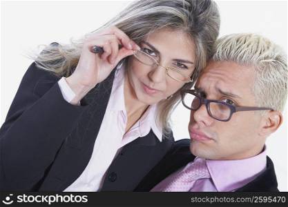 Portrait of a businesswoman and a businessman wearing eyeglasses