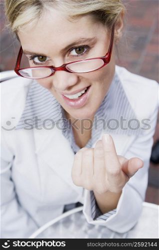 Portrait of a businesswoman gesturing and smiling