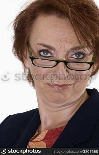 Portrait of a businesswoman making a face