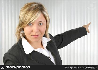 Portrait of a businesswoman pointing with her finger