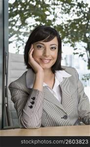 Portrait of a businesswoman smiling in an office
