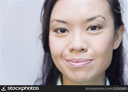 Portrait of a businesswoman smirking