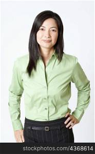 Portrait of a businesswoman standing with her hand on her hip