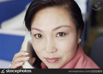 Portrait of a businesswoman talking on the telephone