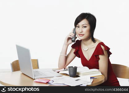 Portrait of a businesswoman talking on the telephone