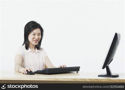 Portrait of a businesswoman using a computer
