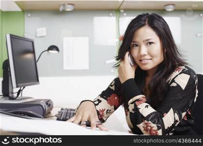 Portrait of a businesswoman using a mobile phone