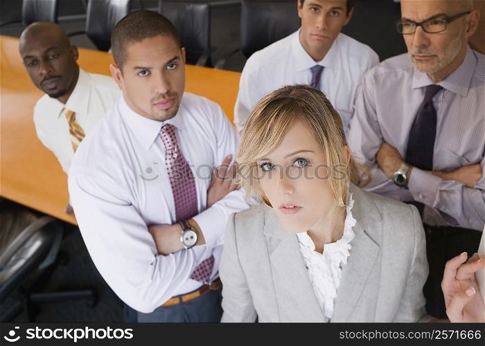 Portrait of a businesswoman with her colleagues