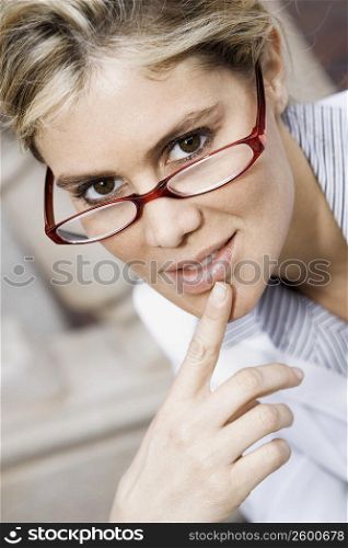 Portrait of a businesswoman with her finger on her chin