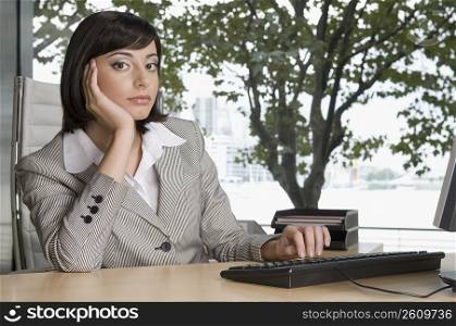 Portrait of a businesswoman working in an office
