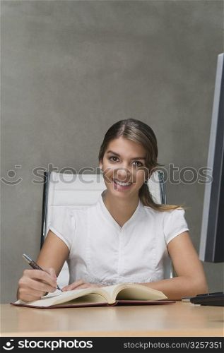 Portrait of a businesswoman working in an office