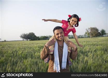 Portrait of a carefree daughter on father&rsquo;s shoulders