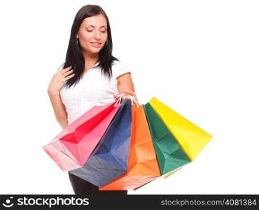 portrait of a cheerful businesswoman holding shopping bags. Concept of commerce and finance in business. Isolated on white