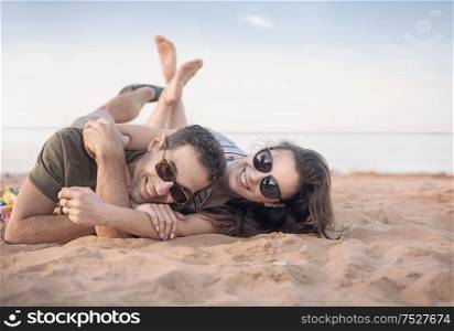 Portrait of a cheerful couple resting on great vacation
