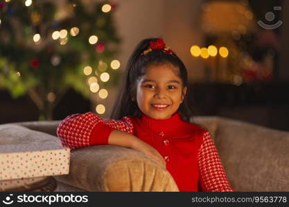 Portrait of a cheerful cute child girl looking at camera