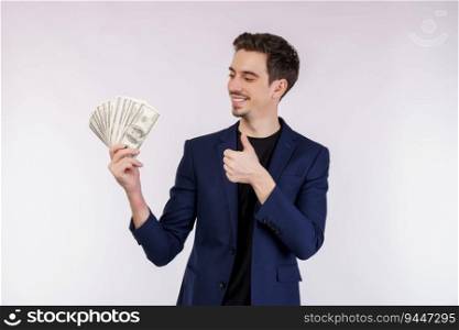 Portrait of a cheerful man holding dollar bills over white background. Finance, investment and money saving concept.