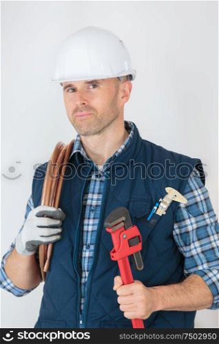 portrait of a cheerful repairman