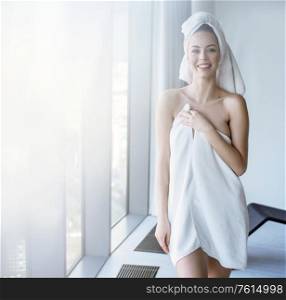 Portrait of a cheerful woman in a spa place
