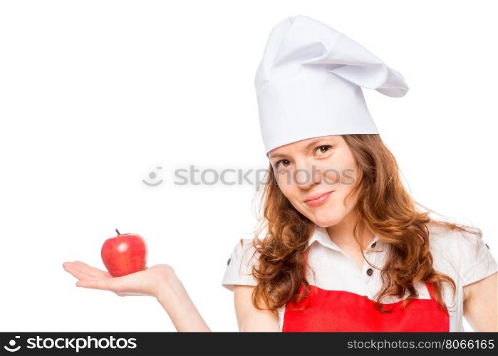 Portrait of a chef holding in the palm of an apple on a white background