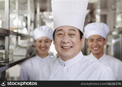 Portrait of a Chef in an Industrial Kitchen