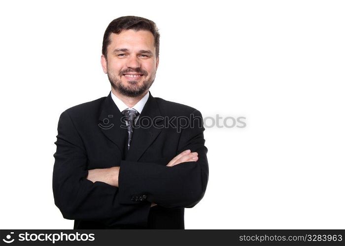 Portrait of a confident mature Caucasian business man with hands folded on white background . Portrait of a confident business man