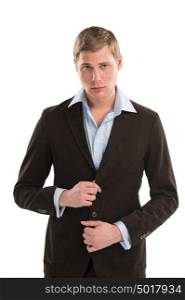 Portrait of a confident young male executive buttoning his cuff on white background