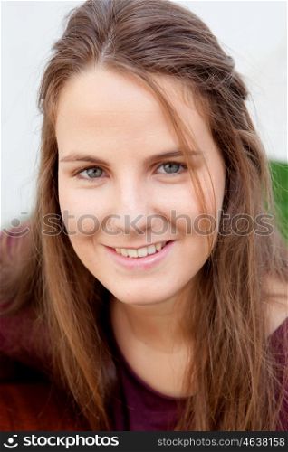 Portrait of a cool woman with long hair smiling