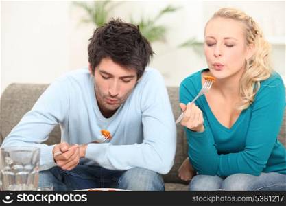 portrait of a couple eating