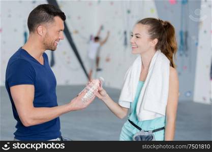 portrait of a couple in climbing gym