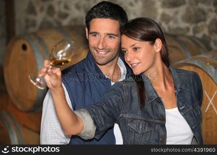 portrait of a couple tasting wine
