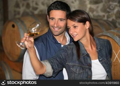 portrait of a couple tasting wine