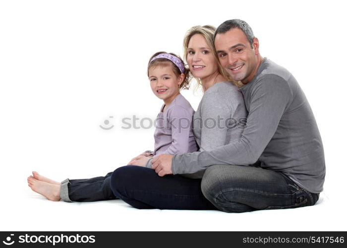 Portrait of a couple with their daughter