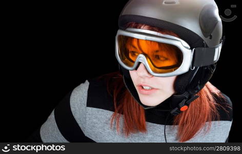 Portrait of a cute girl with red hair snowboarding on a winter background. Studio shot, composite.