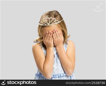 Portrait of a cute little girl wearing a princess crown