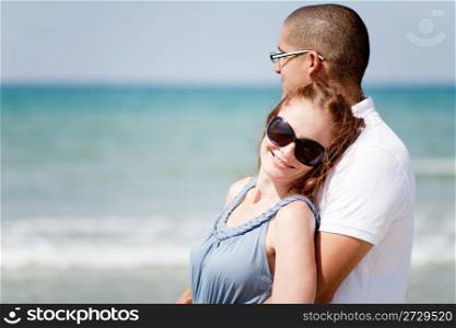 Portrait of a cute romantic couple at beach
