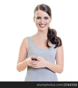 Portrait of a Cute Smiling Brunette Young Woman Holding a Cell Phone over white background