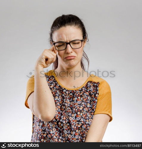 Portrait of a cute woman crying