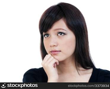 Portrait of a cute young woman thinking with hand on chin, isolated on white background