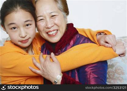 Portrait of a daughter hugging her mother